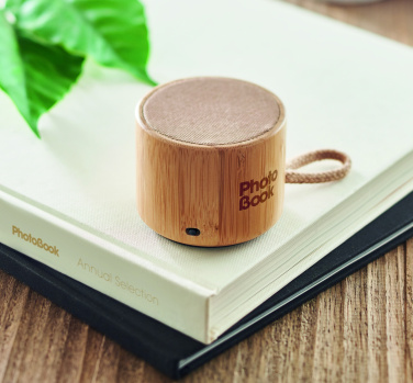 Logotrade promotional item picture of: Round bamboo wireless speaker