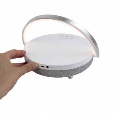 Logotrade mainoslahja tuotekuva: Prixton 10 W:n 4-in-1-Bluetooth®-kaiutin LED-valolla ja langattomalla latausalustalla